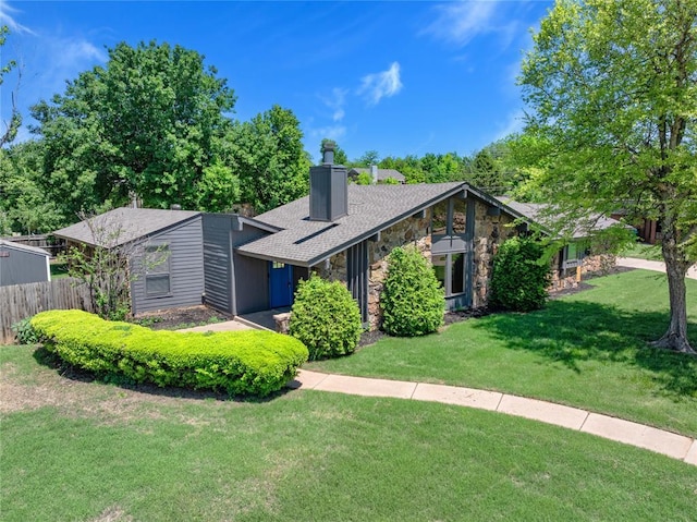 3233 Hickory Stick Rd, Oklahoma City, OK 73120 - view of front of house with a chimney and stone siding