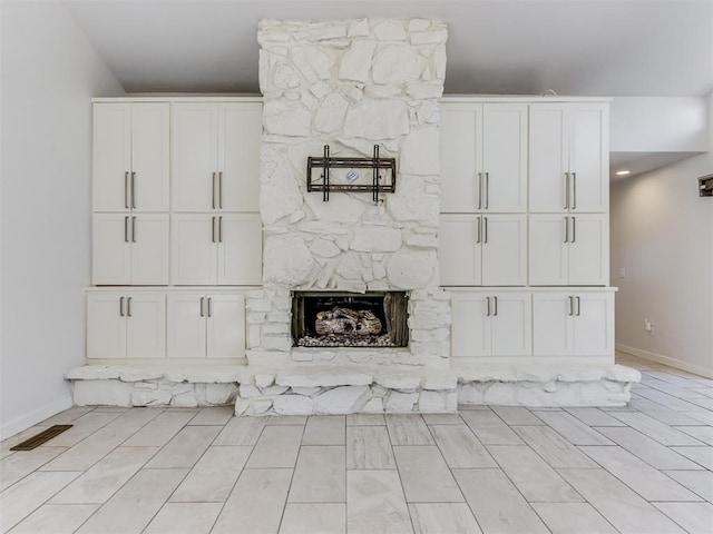 3233 Hickory Stick Rd, Oklahoma City, OK 73120 - unfurnished living room with a fireplace and baseboards