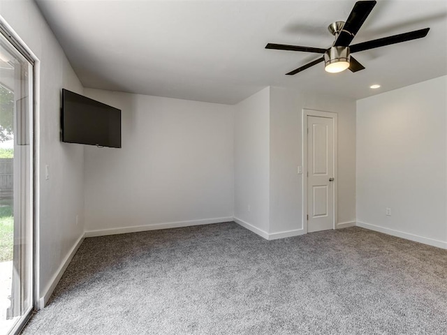 3233 Hickory Stick Rd, Oklahoma City, OK 73120 - carpeted empty room featuring a ceiling fan and recessed lighting