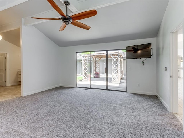 3233 Hickory Stick Rd, Oklahoma City, OK 73120 - unfurnished living room with carpet floors, vaulted ceiling, and a ceiling fan