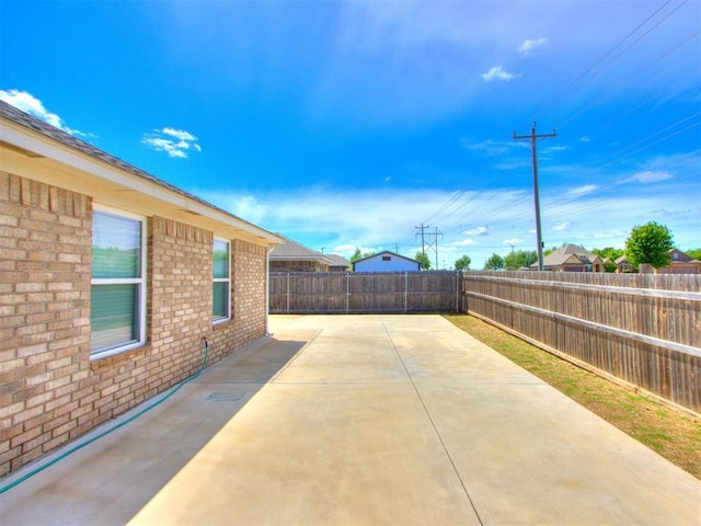 view of patio with a fenced backyard
