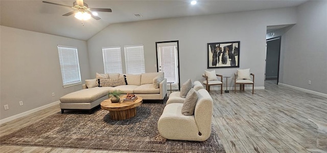 12929 NW 4th St, Yukon, OK 73099 - living area with wood finished floors, baseboards, ceiling fan, and vaulted ceiling