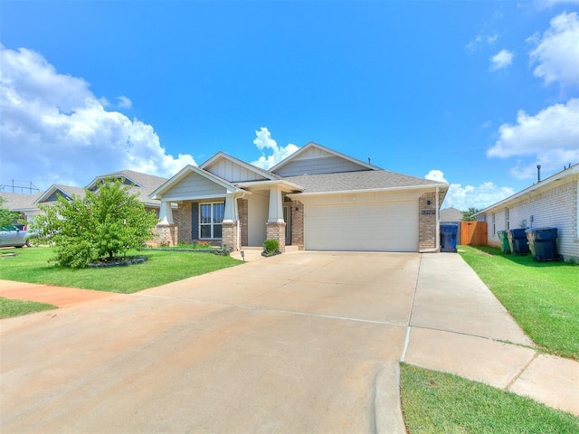 12929 NW 4th St, Yukon, OK 73099 - view of front of home featuring brick siding, an attached garage, and concrete driveway