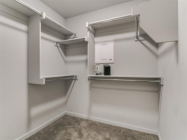 12929 NW 4th St, Yukon, OK 73099 - walk in closet featuring carpet