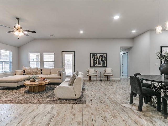 12929 NW 4th St, Yukon, OK 73099 - living area with light wood finished floors, ceiling fan, vaulted ceiling, and recessed lighting
