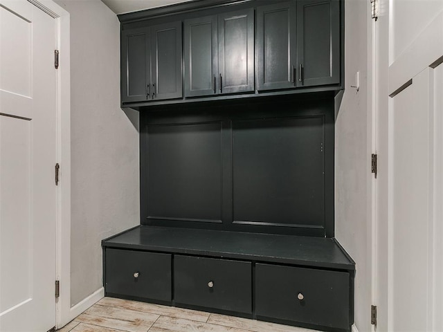 12929 NW 4th St, Yukon, OK 73099 - mudroom featuring baseboards and light wood finished floors