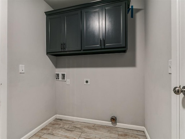 12929 NW 4th St, Yukon, OK 73099 - laundry area with hookup for an electric dryer, cabinet space, light wood-style floors, and hookup for a washing machine