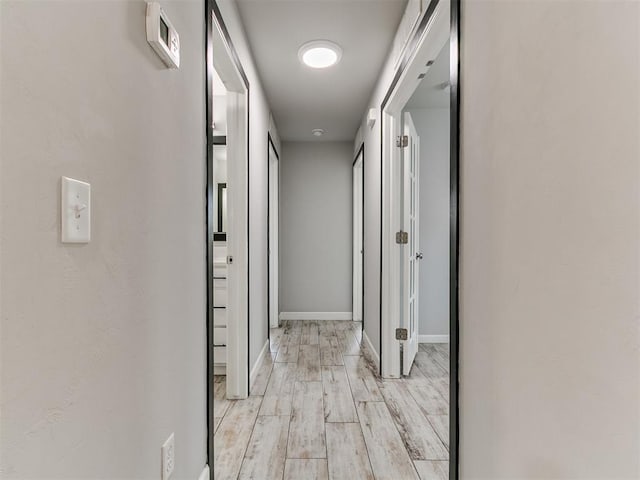 12929 NW 4th St, Yukon, OK 73099 - hall with light wood-type flooring and baseboards