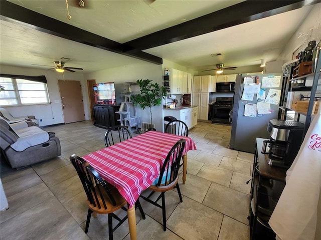 dining area featuring ceiling fan, light tile patterned flooring, and beam ceiling