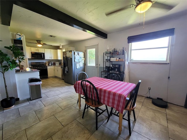 dining room with light tile patterned floors, ceiling fan, beam ceiling, and visible vents
