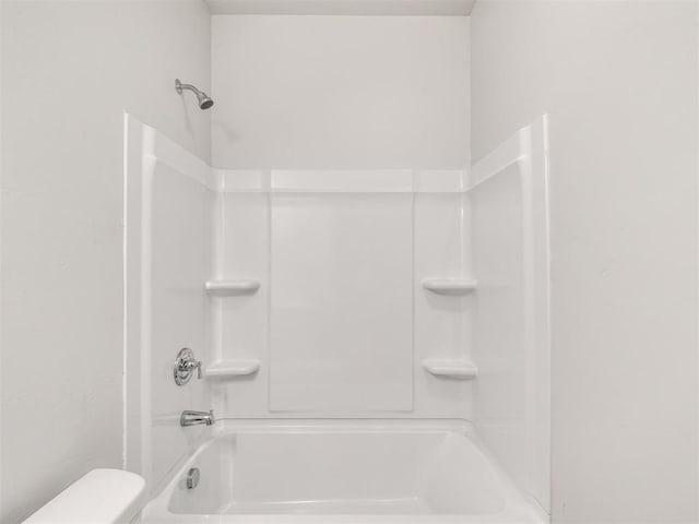 full bath with bathtub / shower combination and toilet