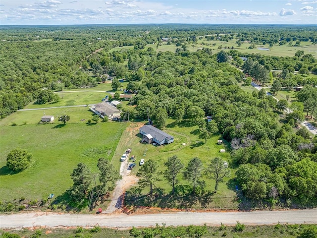 aerial view featuring a view of trees