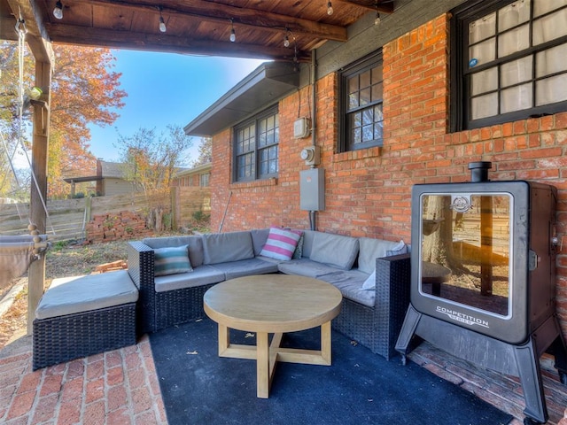 view of patio with fence and an outdoor living space