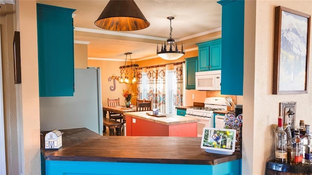 kitchen featuring white appliances, crown molding, wood counters, and a center island