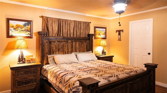 bedroom with baseboards, ornamental molding, and dark wood-type flooring
