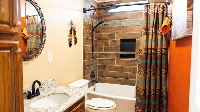 full bathroom with vanity, toilet, and shower / tub combo