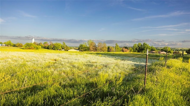 exterior space with a rural view