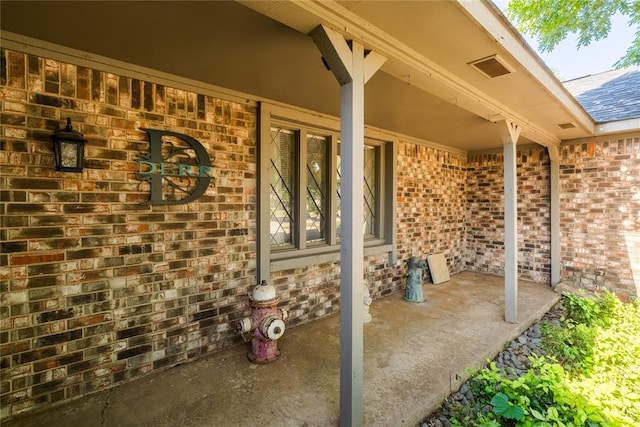 view of patio featuring a porch