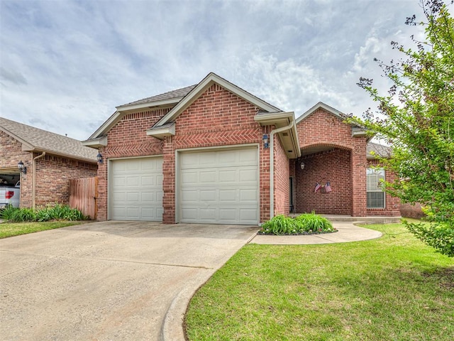 ranch-style home featuring concrete driveway, brick siding, a garage, and a front lawn