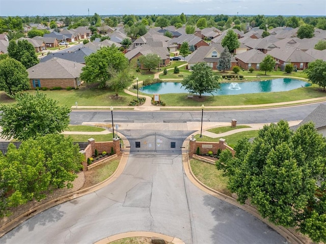 aerial view with a water view and a residential view