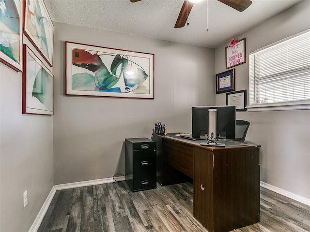 5416 S Independence Ave, Oklahoma City, OK 73119 - office space featuring dark wood-style flooring, a ceiling fan, baseboards, and a textured ceiling