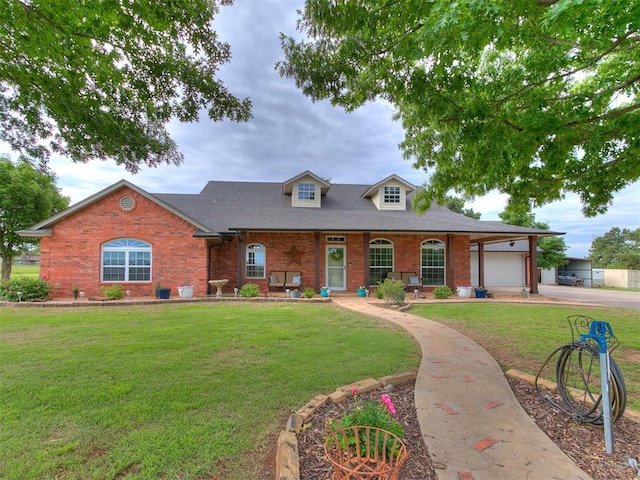 view of front of home featuring concrete driveway, brick siding, an attached garage, and a front yard