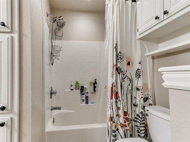 bathroom featuring toilet and shower / bath combo with shower curtain