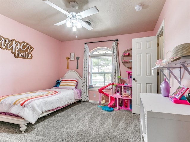 bedroom featuring ceiling fan, carpet, baseboards, and visible vents