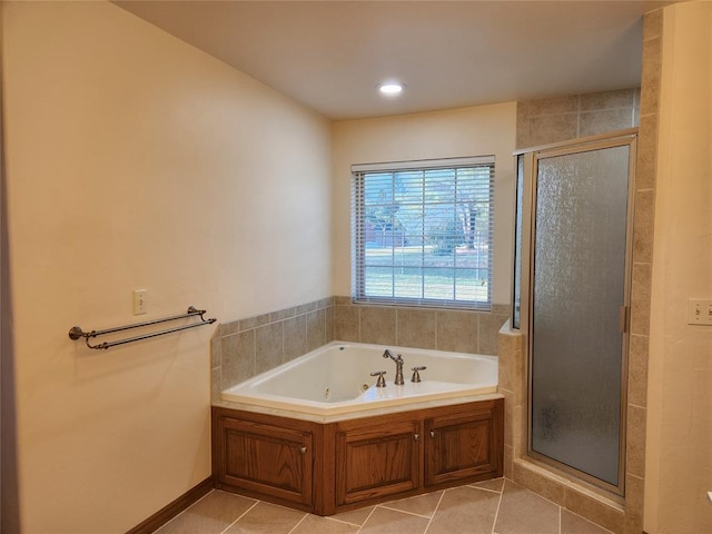 full bathroom featuring a shower stall, tile patterned flooring, a jetted tub, and recessed lighting