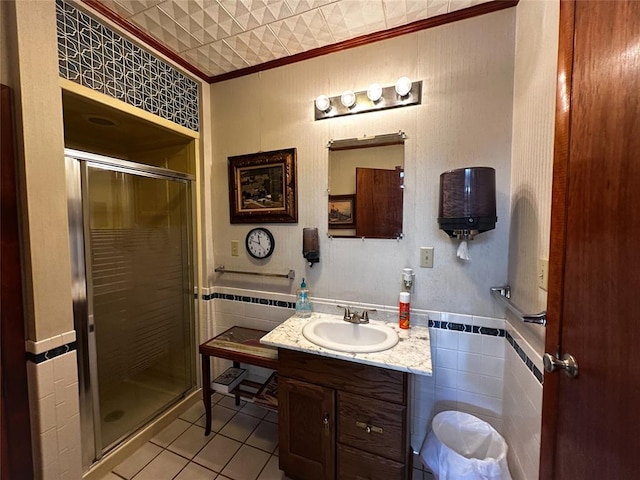 16296 N County Road 3264th Rd, Pauls Valley, OK 73075 - full bathroom with tile patterned flooring, vanity, tile walls, ornamental molding, and a stall shower