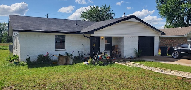 single story home featuring a garage, roof with shingles, a front yard, brick siding, and driveway