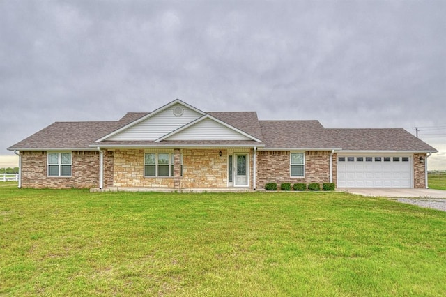 34701 E County Road 1610, Pauls Valley, OK 73075 - ranch-style house with an attached garage, concrete driveway, brick siding, and a front yard