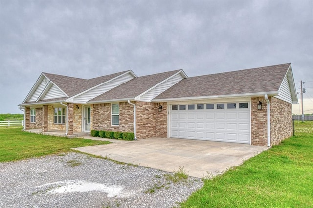 34701 E County Road 1610, Pauls Valley, OK 73075 - single story home featuring concrete driveway, an attached garage, a front lawn, and fence