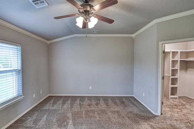 34701 E County Road 1610, Pauls Valley, OK 73075 - interior space featuring a spacious closet, visible vents, ornamental molding, and carpet floors