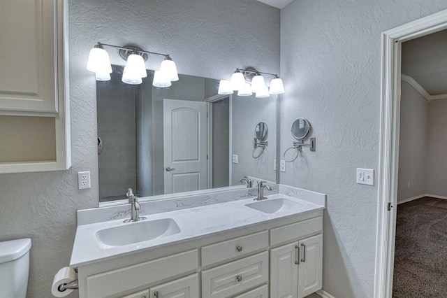 34701 E County Road 1610, Pauls Valley, OK 73075 - full bath with a textured wall, toilet, and a sink