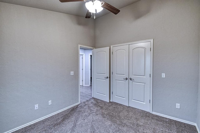 34701 E County Road 1610, Pauls Valley, OK 73075 - unfurnished bedroom with lofted ceiling, a closet, baseboards, ceiling fan, and carpet floors