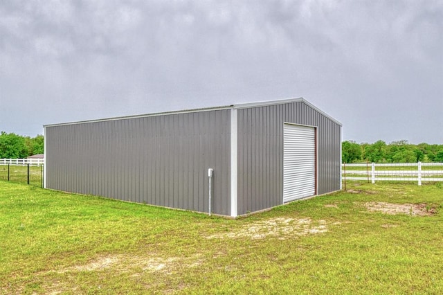 34701 E County Road 1610, Pauls Valley, OK 73075 - view of pole building with a lawn and fence