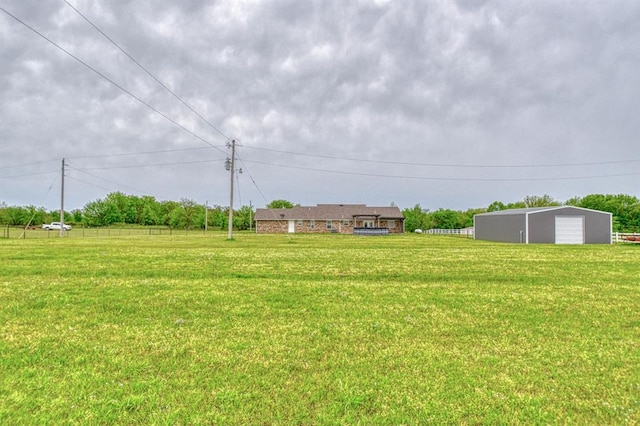34701 E County Road 1610, Pauls Valley, OK 73075 - view of yard with an outdoor structure, a pole building, and a garage