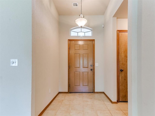 8233 Greer Way, Oklahoma City, OK 73132 - foyer featuring baseboards and light tile patterned floors