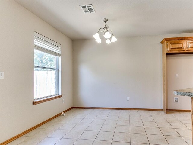 8233 Greer Way, Oklahoma City, OK 73132 - unfurnished room with a chandelier and baseboards