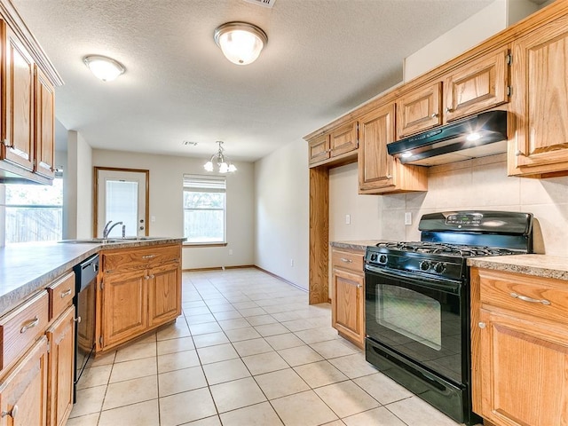 8233 Greer Way, Oklahoma City, OK 73132 - kitchen with black appliances, under cabinet range hood, a sink, light tile patterned floors, and a chandelier