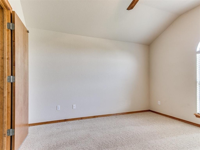 8233 Greer Way, Oklahoma City, OK 73132 - carpeted empty room with vaulted ceiling, a ceiling fan, and baseboards