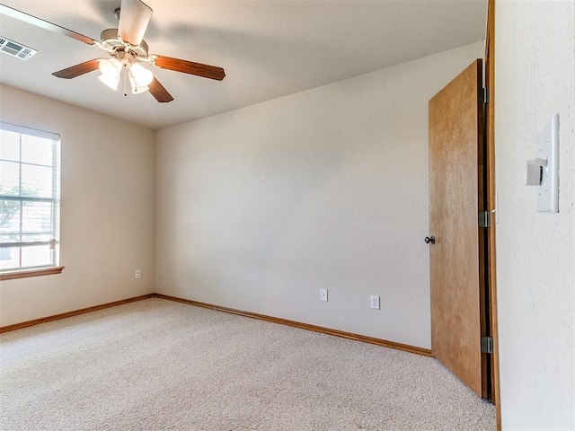 8233 Greer Way, Oklahoma City, OK 73132 - carpeted empty room featuring a ceiling fan and baseboards