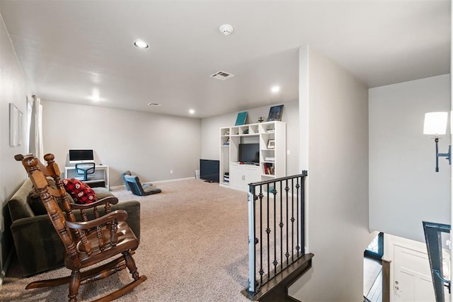 interior space with recessed lighting, baseboards, carpet flooring, visible vents, and an upstairs landing
