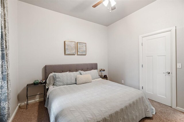 bedroom featuring baseboards, ceiling fan, and carpet floors