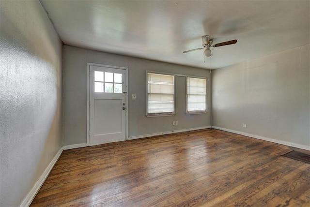 3924 Teal Dr, Del City, OK 73115 - foyer featuring a ceiling fan, wood finished floors, and baseboards