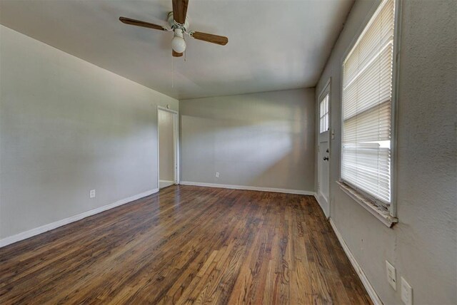 3924 Teal Dr, Del City, OK 73115 - empty room featuring wood finished floors, a ceiling fan, and baseboards