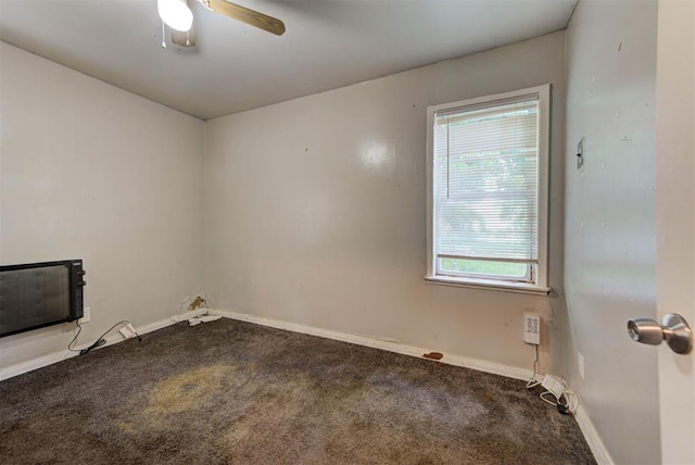 3924 Teal Dr, Del City, OK 73115 - unfurnished room featuring healthy amount of natural light, carpet flooring, baseboards, and a ceiling fan