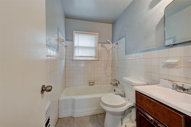3924 Teal Dr, Del City, OK 73115 - bathroom with toilet, tile walls, shower / bath combination, tile patterned floors, and vanity