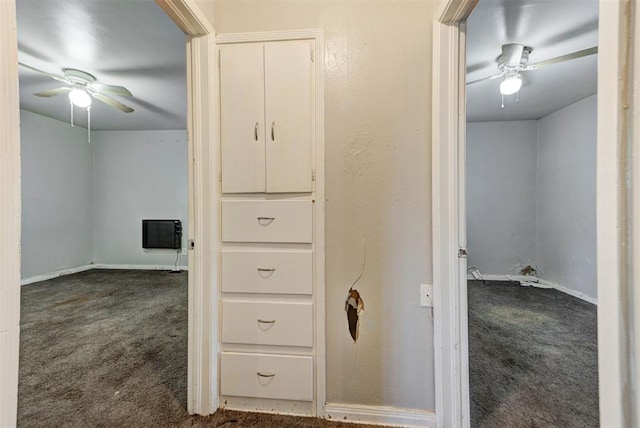 3924 Teal Dr, Del City, OK 73115 - hallway with dark carpet and baseboards